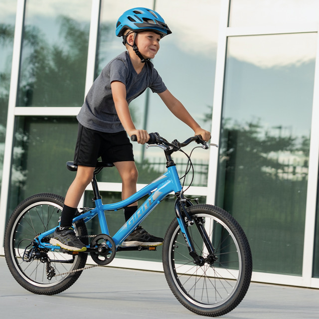 child riding bike